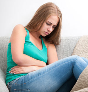 Woman with stomach pain